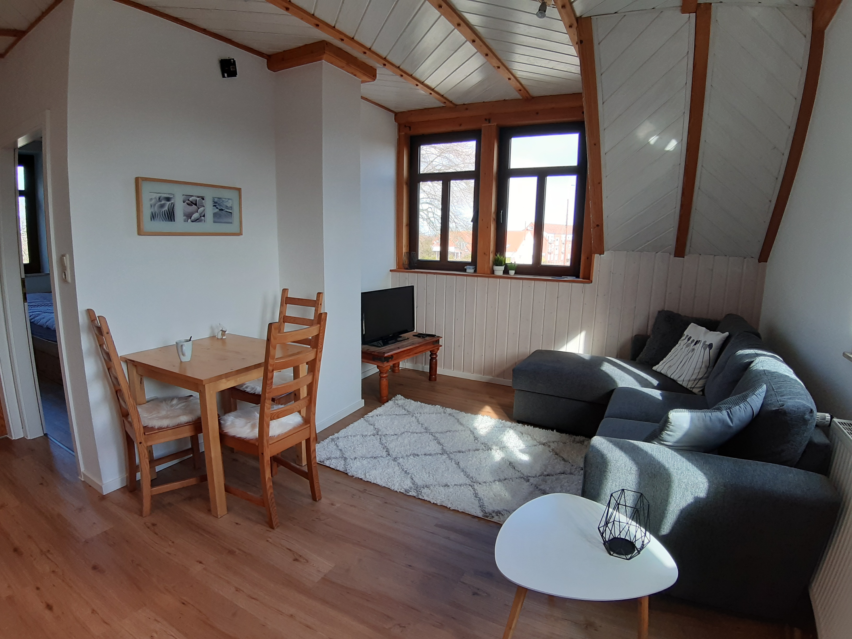 Wohnzimmer mit Küche